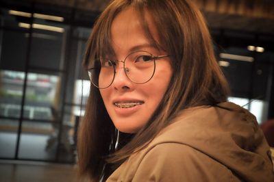 Portrait of smiling woman with braces