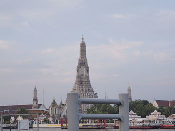 Buildings in city against sky