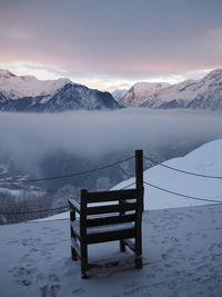 Scenic view of snowcapped mountains against sky during winter