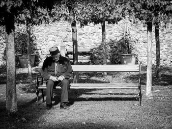 Men sitting on bench