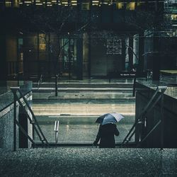 Woman standing in city