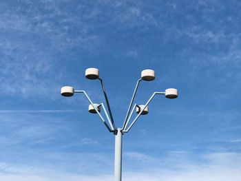 Low angle view of street light against sky