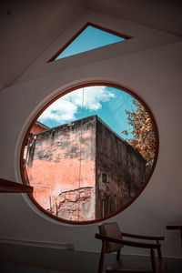 Reflection of building on glass window