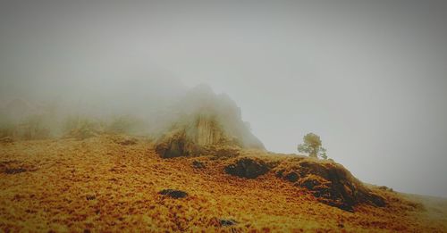 Scenic view of rocky mountains against sky