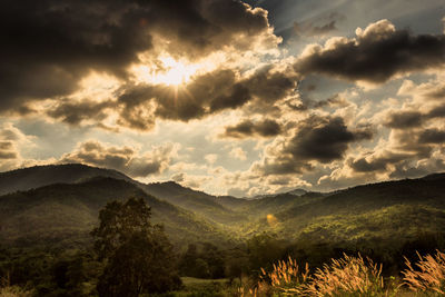 Scenic view of mountains against sky during sunset
