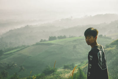 Full length of man standing on land