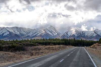 Scenic view along the mount cook road alongside with snow capped southern alps and majestic mt cook.