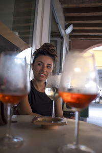 Portrait of woman holding wineglass