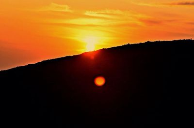 Scenic view of landscape at sunset