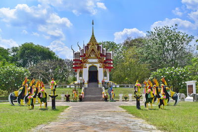 Group of people in temple against building