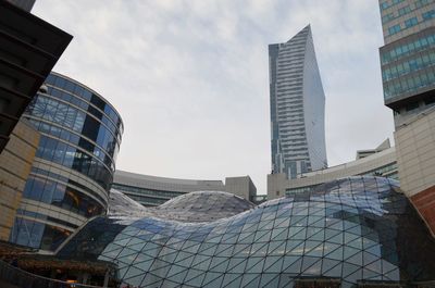 Low angle view of modern buildings against sky