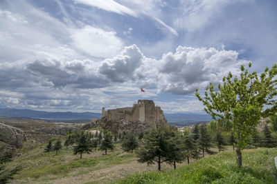 View of castle against cloudy sky