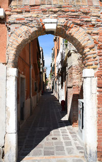 Narrow alley along buildings