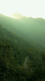 Scenic view of landscape against cloudy sky