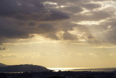 Scenic view of mountains against sky during sunset