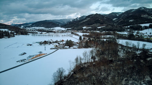 Scenic view of snowcapped mountains against sky