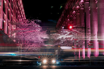 Light trails on street in city at night