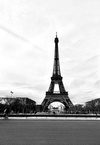 Tower against cloudy sky