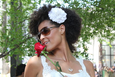 Portrait of young woman wearing sunglasses