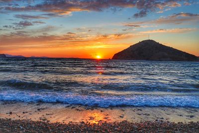 Scenic view of sea against sky during sunset