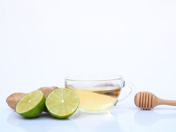 Close-up of fruits against white background