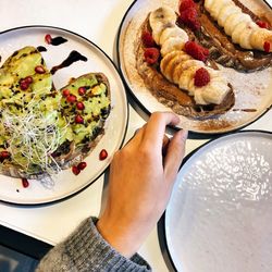 High angle view of person having breakfast