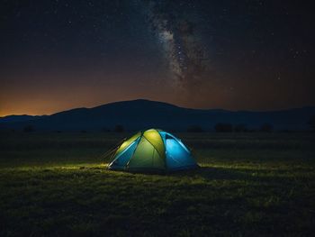 Tent against sky at night