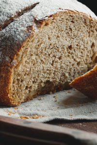 Close-up of bread on textile