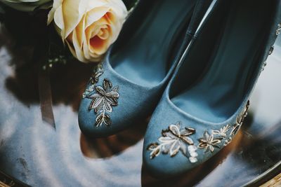 High angle view of bridal shoes