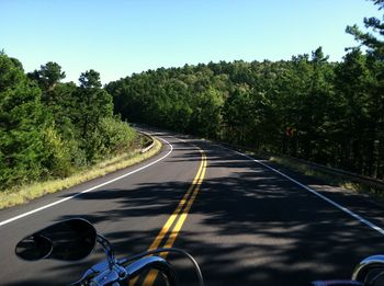 Empty road against sky