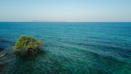 Scenic view of sea against clear sky