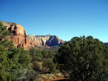 Scenic view of rocky mountains against clear sky