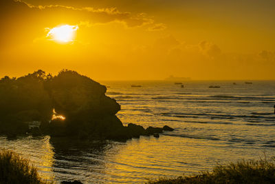 Scenic view of sea against sky during sunset
