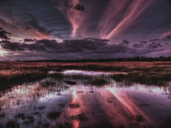 Scenic view of dramatic sky during sunset