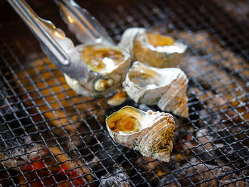 High angle view of food on barbecue grill