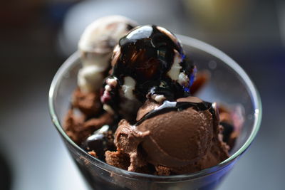 Close-up of chocolate ice cream sundae in glass
