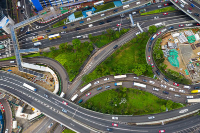 High angle view of vehicles on road in city