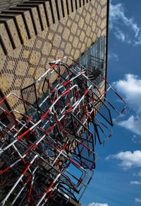 Low angle view of ferris wheel against sky