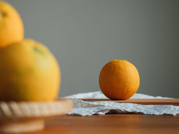 Close-up of orange fruit on table