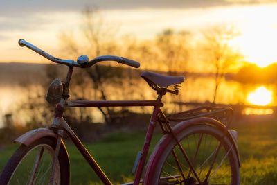 Bicycle parked on field