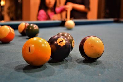 Close-up of balls on pool table