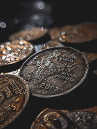 High angle view of coins on table