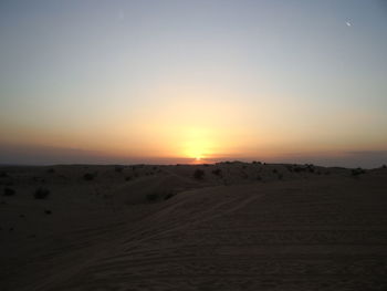 Scenic view of landscape at sunset