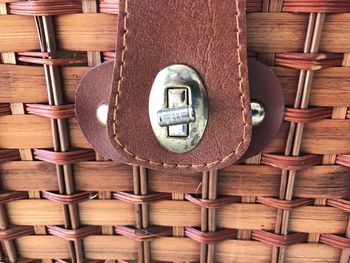 High angle view of wicker basket on shelf at home