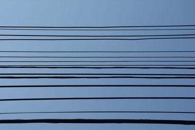 Low angle view of power lines