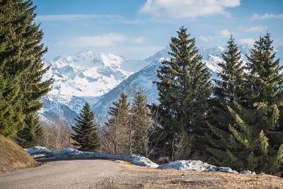 Scenic view of snowcapped mountains against sky