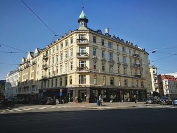 Low angle view of buildings against clear sky