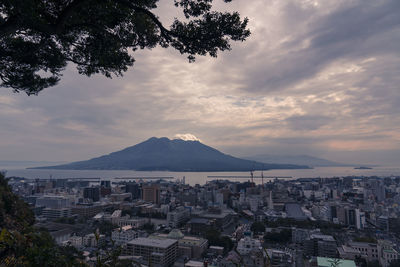 Aerial view of city at sunset