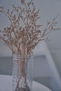 Close-up of flower vase on table