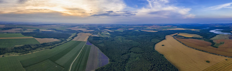 Aerial view of agricultural field against sky